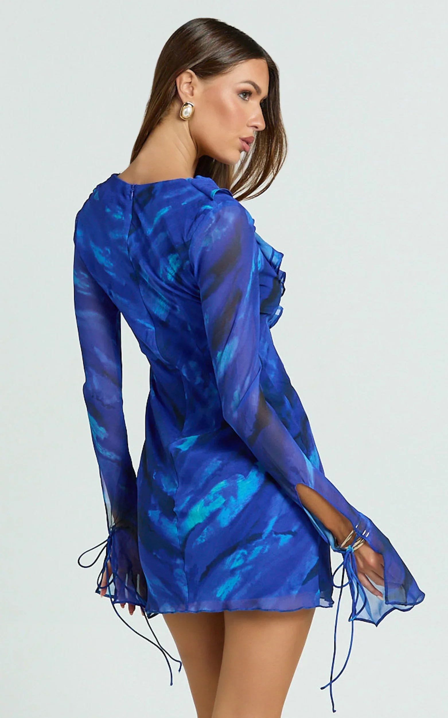 Alesya Mini Dress Ruffle Plunge Neck Long Sleeve Tie Detail Dress in Blue Abstract